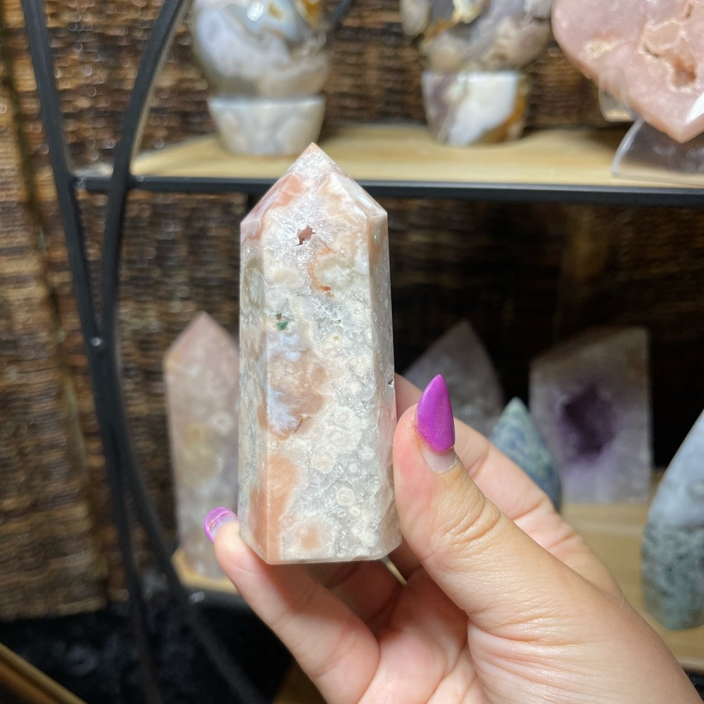 Pink amethyst with flower agate tower